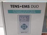 the box is open to show the contents of a tens - ems duo