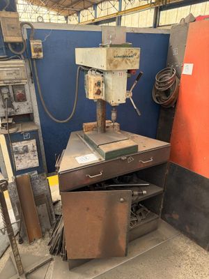 a machine that is sitting inside of a building