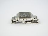 a watch that is sitting on top of a bracelet
