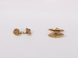 two pairs of gold earrings with blue stones on them