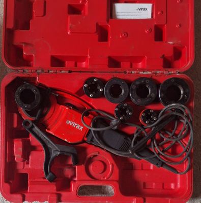 an image of a red box with tools in it on the floor