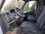 a view of the inside of a van from the driver ' s seat