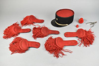 a hat, gloves and a pair of scissors on a table