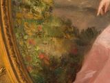 an oil painting of a woman in a pink dress sitting in a garden