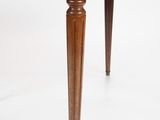 an image of a wooden table with a glass top