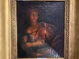 a painting of a woman holding a baby in a gold frame