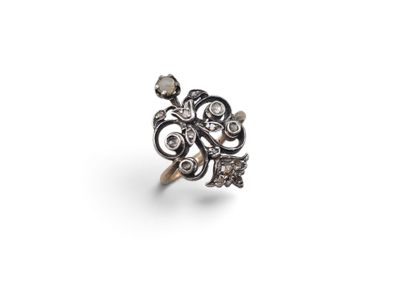 a close up of a ring on a white surface