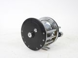 an image of a fishing reel on a white background