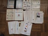a lot of different stamps on the pages of a book