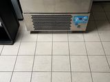 an image of a stainless steel refrigerator in a kitchen