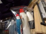 a bag of toothbrushes, toothpaste, toothpaste, and toothpaste paste sitting on a table