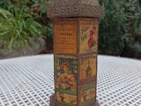 a small wooden box sitting on a table in the garden