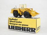 a toy truck that is sitting on top of a box