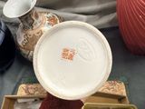 a person that is holding a plate with some food in it