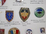 many different types of badges on a piece of paper