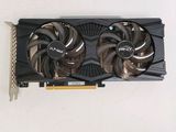 the graphics card has two fans attached to it ' s back