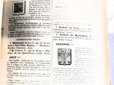 un livre ouvert sur lequel figure l'image d'une horloge