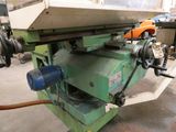 an image of a machine that is sitting in a garage