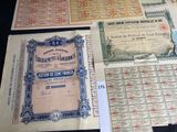 several old and new currency are on display on a table