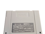 a close up of a nintendo game on a white surface