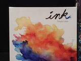 a picture of a box of ink next to a box of ink