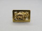 an image of a gold plated elephant on a white background