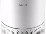a close up of a white air purifier on a white background
