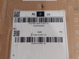 a box with a barcode on it sitting on a table