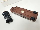 two toy cars that are sitting next to each other