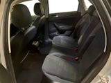 the interior of a car with the front seats folded down