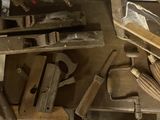 a lot of tools that are sitting on a shelf