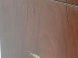 a close up of a piece of wood with a hole in it