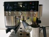 a coffee machine that is sitting on a counter