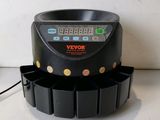 an image of a black counter top with a clock on it