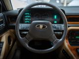 dashboard of a car with a steering wheel and dashboard controls