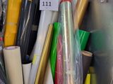 many different types of wrapping materials in a bin
