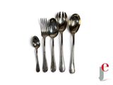 four spoons and a fork on a white surface