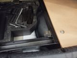 a box with tools inside of it on the floor