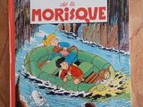 the book le roc de morbique is on a wooden table