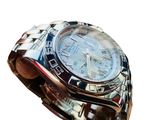 a watch that is sitting on top of a table