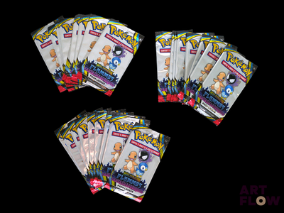 five packs of pokemon trading cards on a black background