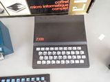 a computer keyboard and a mouse on a table