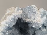 a close up of a piece of rock with a lot of crystals on it