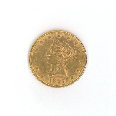 une image d'une pièce d'or sur une surface blanche