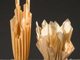 two vases that have been made out of paper