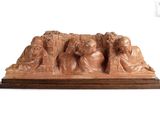 an image of a sculpture of a group of people sitting on a bench