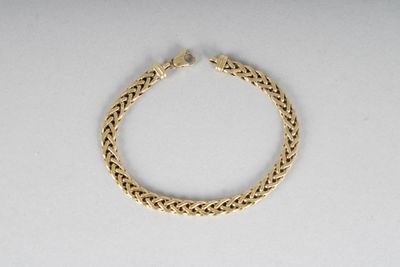 bracelet en or tressé, l. 19 cm, poids 8.4 g env. (état d'us… - Photo 1