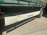 a truck that is parked on the side of the road