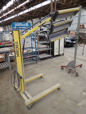 an image of a machine that is sitting in a warehouse
