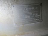 a metal plaque on the side of a machine